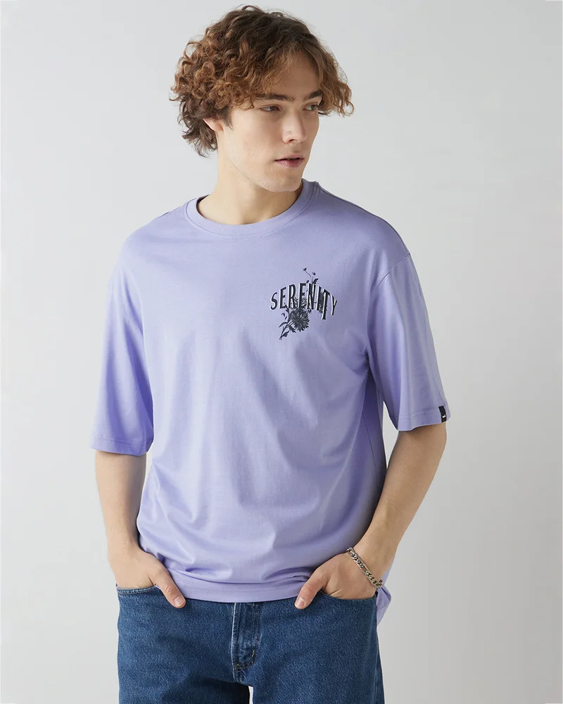 bewakoof Men's Baby Lavender Serenity Graphic Printed Oversized T-shirt
